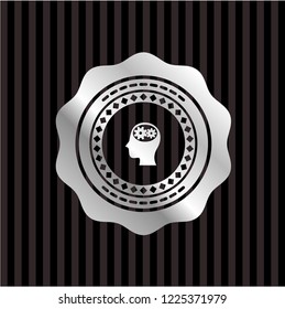 head with gears inside icon inside silvery badge or emblem