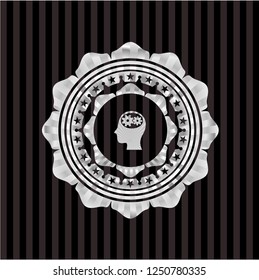 head with gears inside icon inside silvery emblem or badge