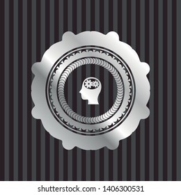 head with gears inside icon inside silvery badge or emblem