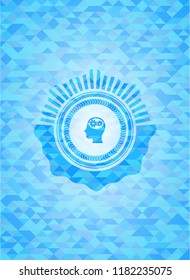 head with gears inside icon inside sky blue emblem with triangle mosaic background