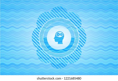 head with gears inside icon inside sky blue water wave badge background.
