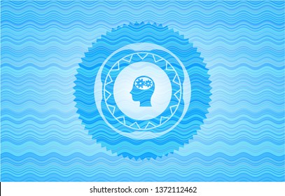 head with gears inside icon inside water wave representation style badge.