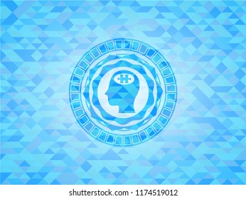 head with jigsaw puzzle piece icon inside light blue mosaic emblem