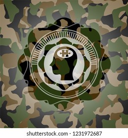 head with jigsaw puzzle piece icon inside camouflaged emblem