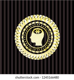 head with jigsaw puzzle piece icon inside gold shiny badge