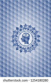head with jigsaw puzzle piece icon inside blue emblem or badge with geometric pattern background.