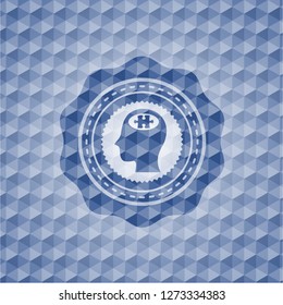 head with jigsaw puzzle piece icon inside blue emblem or badge with abstract geometric pattern background.