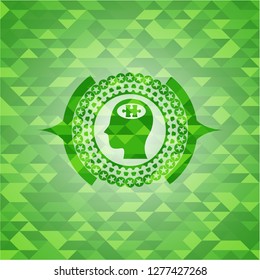 head with jigsaw puzzle piece icon inside green mosaic emblem