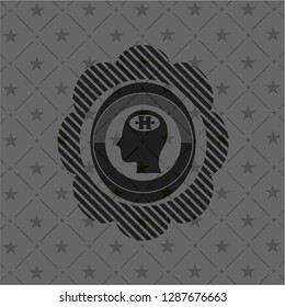 head with jigsaw puzzle piece icon inside dark emblem