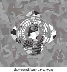 head with jigsaw puzzle piece icon inside grey camo texture