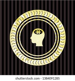 head with jigsaw puzzle piece icon inside golden emblem or badge
