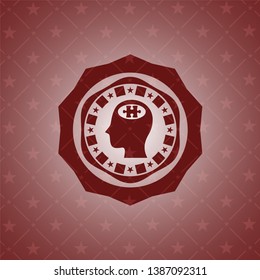 head with jigsaw puzzle piece icon inside realistic red emblem