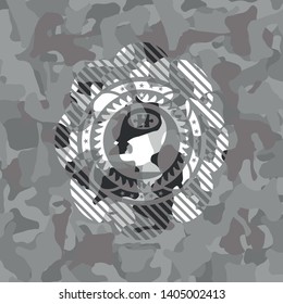 head with jigsaw puzzle piece icon on grey camo pattern