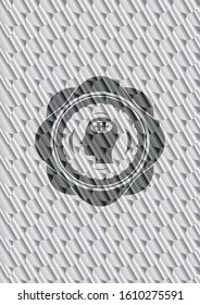 head with jigsaw puzzle piece icon inside shiny silver emblem. Scales pattern. Vector Illustration. Detailed.