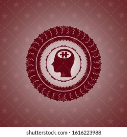 head with jigsaw puzzle piece icon inside red icon or emblem
