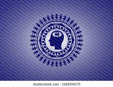 cabeza con icono de la pieza del rompecabezas dentro del emblema con fondo jean de alta calidad. 