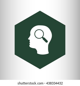 head and magnifying glass icon