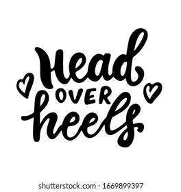 Head over heels. In love saying. English idiom, hand lettering, brush calligraphy. Youth slang. Inspire and motivational quote.  Print for poster's, t-shirt, bag, cups, card, flyer, sticker, badge. 