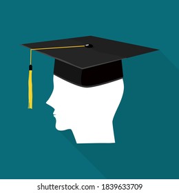 The head of the person wearing a graduation hat. Educational success concept