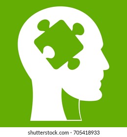 Head with puzzle icon white isolated on green background. Vector illustration