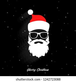 Head of Santa Claus on a black background with beard. Christmas Santa. New year