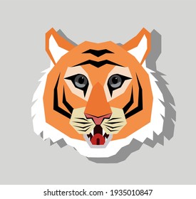 Head of tiger in geometric style with drop shadow isolated on grey background. Panthera tigris. Chinese new year of tiger 2022 concept