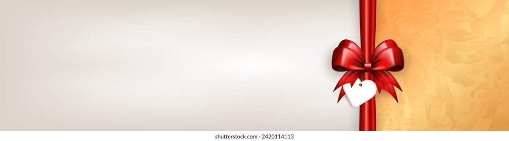 Header with 3d bright red bow with vertical silk ribbon, paper label tag and golden frame on white background with copy space for text. Scarlet bow with tape as gift box, present wrapping for holidays