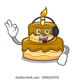With headphone birthday cake mascot cartoon