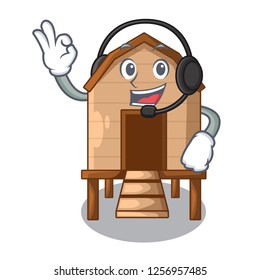 With headphone chicken in a wooden cartoon coop