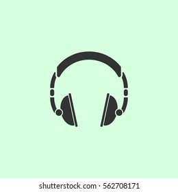 Headphone icon flat. Grey vector symbol on green background