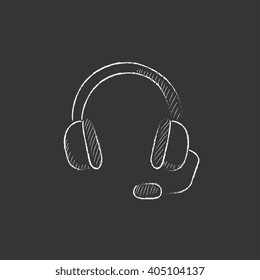 Headphone with microphone. Drawn in chalk icon.