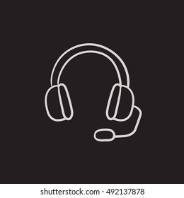 Headphone with microphone vector sketch icon isolated on background. Hand drawn Headphone with microphone icon. Headphone with microphone sketch icon for infographic, website or app.