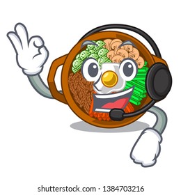 With headphone plate containing bibimbap cartoon on table