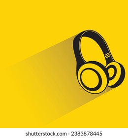 headphone with shadow on yellow background