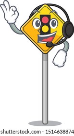 With headphone traffic light ahead on roadside characters