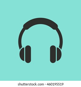 Headphone vector icon. Black illustration isolated on green background for graphic and web design.