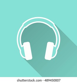Headphone vector icon with long shadow. White illustration isolated on green background for graphic and web design.