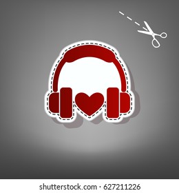 Headphones with heart. Vector. Red icon with for applique from paper with shadow on gray background with scissors.