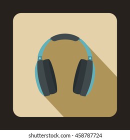 Headphones icon in flat style on a beige background