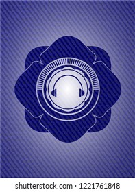 headphones icon inside badge with denim background