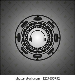 headphones icon inside dark emblem