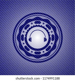 headphones icon inside emblem with jean texture