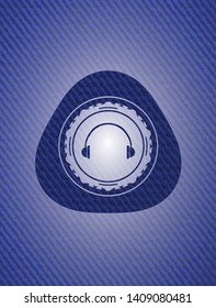 headphones icon inside emblem with jean high quality background