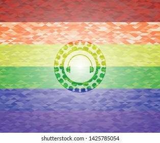 headphones icon inside emblem on mosaic background with the colors of the LGBT flag