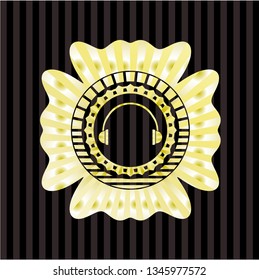 headphones icon inside gold shiny badge