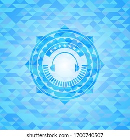 headphones icon inside light blue mosaic emblem