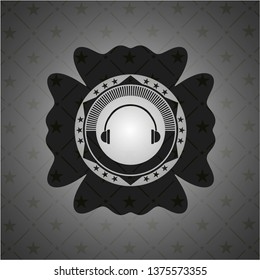 headphones icon inside realistic dark emblem