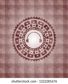 headphones icon inside red seamless badge with geometric pattern background.