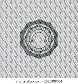 headphones icon inside silver shiny emblem. Scales pattern. Vector Illustration. Detailed.