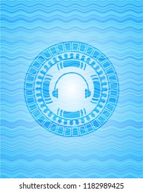 headphones icon inside water badge background.